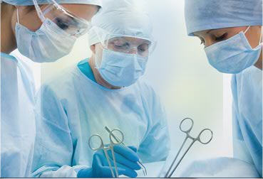 doctors in surgery using surgical instruments